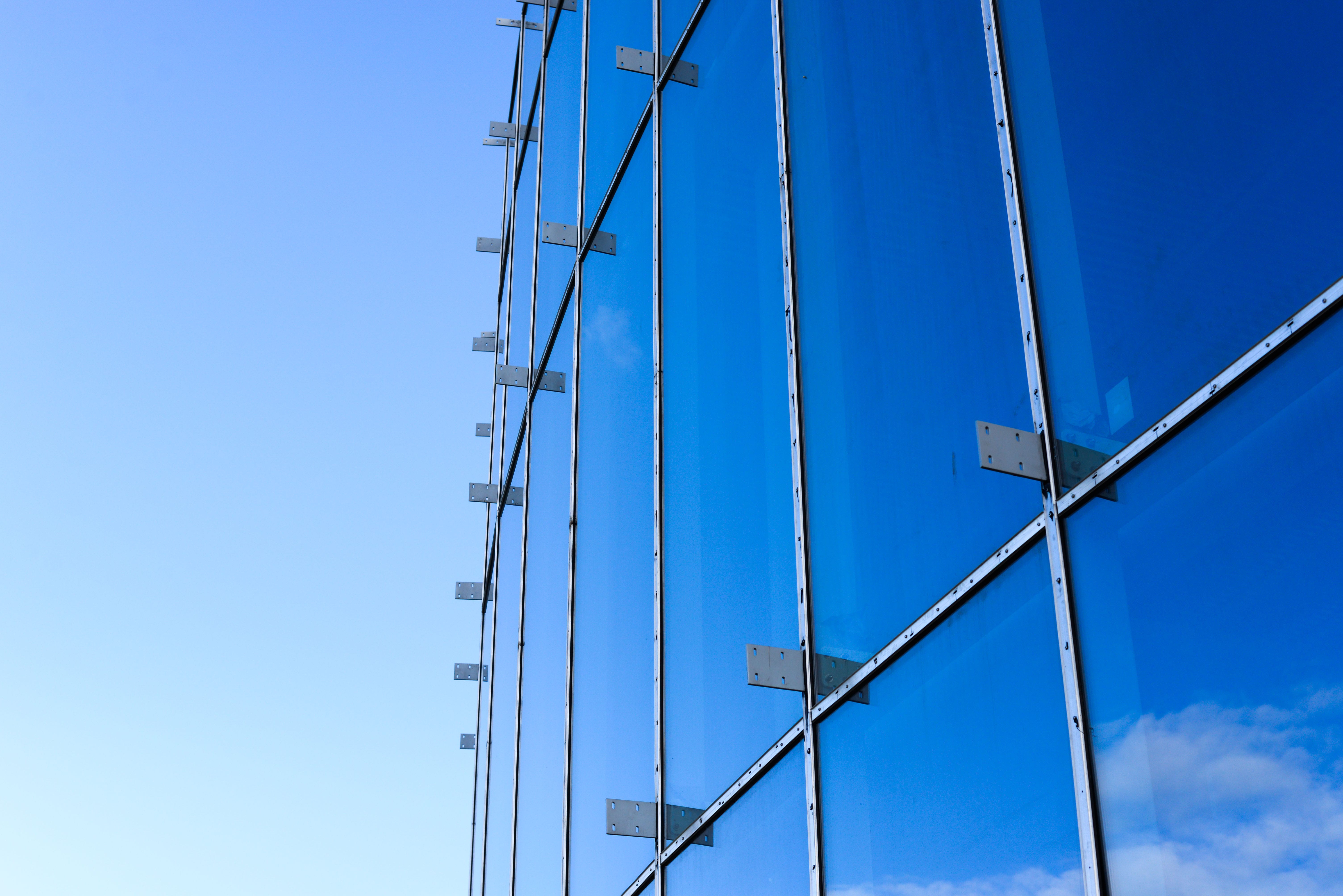 Image of large windows and a blue sky