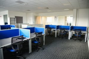 Image of singular desks in an office format