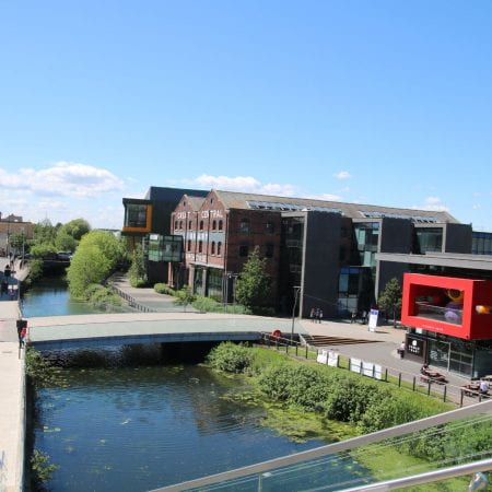 Image of a river with buildings on either side