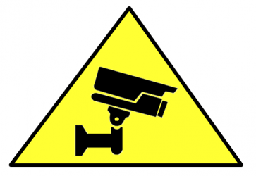 Image of a cctv sign, a camera on a yellow triangle