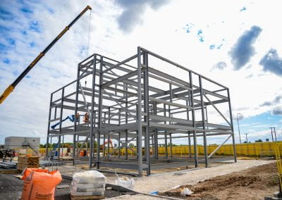 Image of a steel frame of a building on a building site