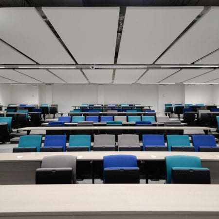 Image of a learning lecture theatre where chairs can turn 180 degrees.