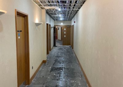 Image of a long corridor undergoing refurbishment