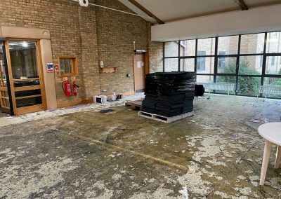 Image of a large empty and stripped out reception area
