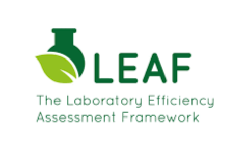 logo of a lab bottle and a leaf
